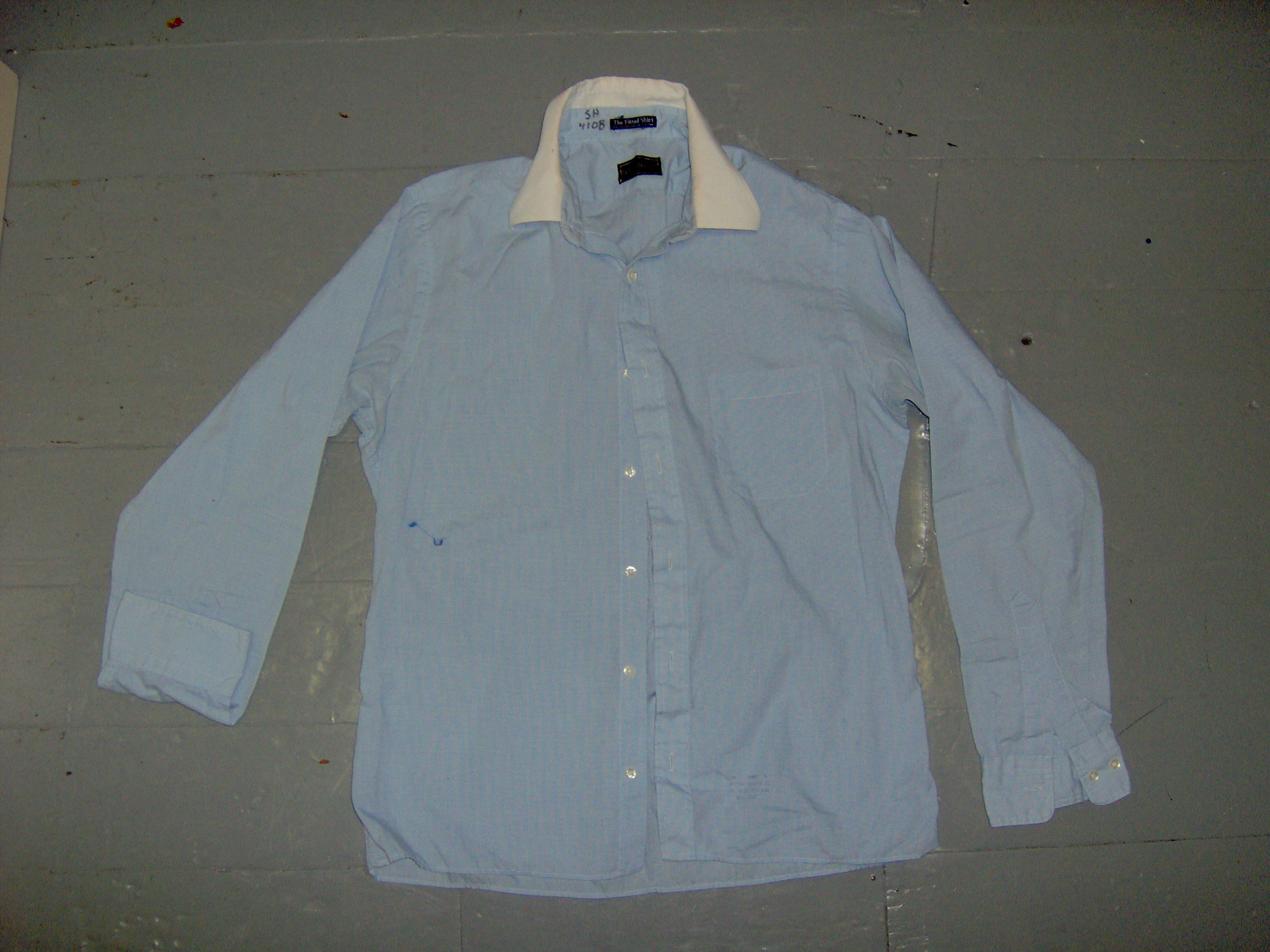 light blue dress shirt with white collar