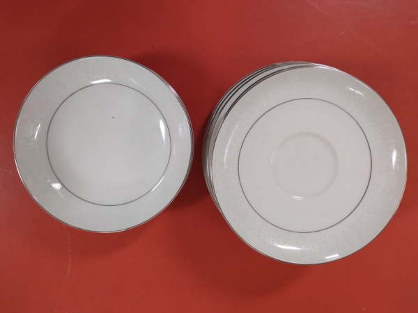 Silver-rimmed plates and bowls